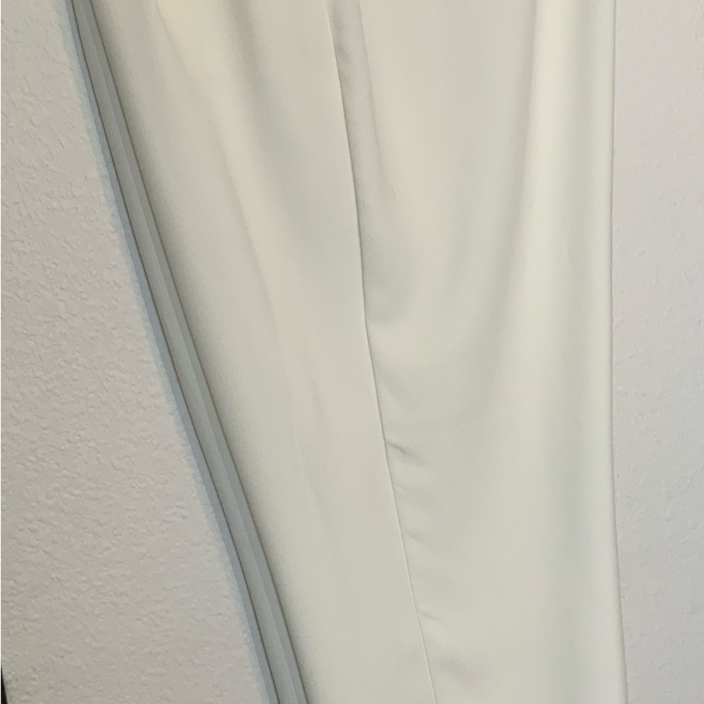 White and Sexy guaranteed ladies new without tags but very feminine.